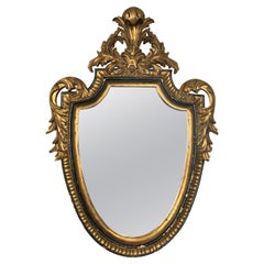 Miroir en bois doré de style Louis XV par Dauphine