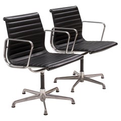 Charles & Ray Eames for ICF EA 108 Black Leather & Aluminium Chairs, Set of 2