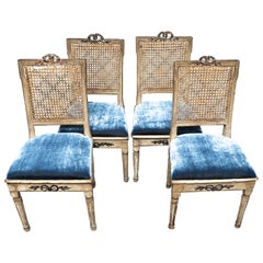 Set of Four Louis XVI Canned and Carved Chairs with Velvet Seats