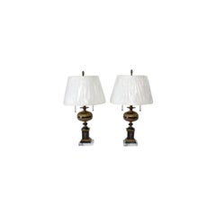 Pair of Neoclassical Revival Brass and Black Resin Lamps