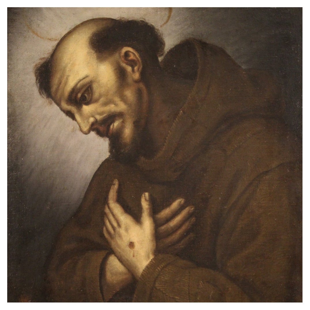 Antique Italian painting from the 17th century. Framework oil on canvas depicting a religious subject Saint Francis of good pictorial quality. Small painting, for antique dealers, interior decorators and collectors of ancient sacred art, adorned