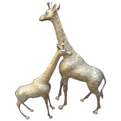 Pair of Mid-Century Hollywood Regency Brass Giraffe Statues