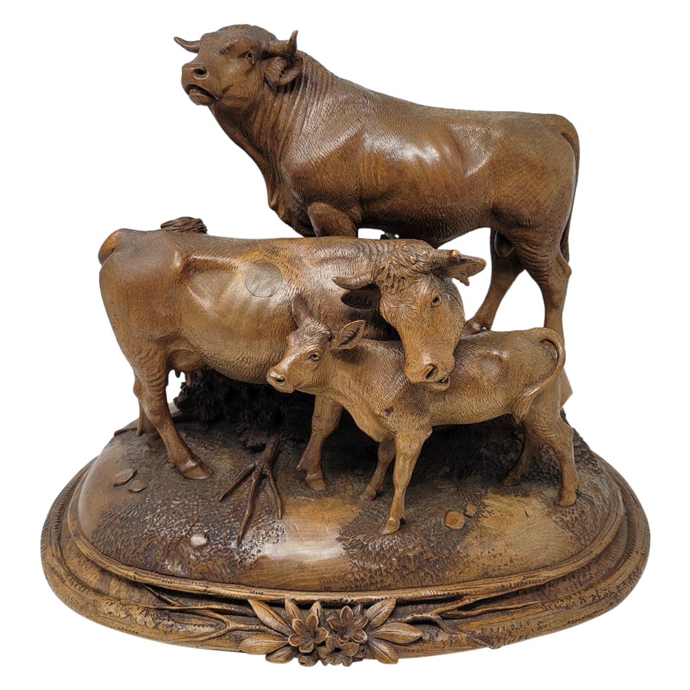 Sculpture sur bois suisse ancienne, famille de vaches, vers 1880-1900