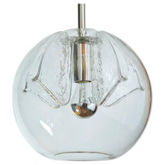 Ensemble de huit lanternes à suspension italiennes en verre soufflé transparent