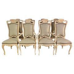 Ensemble de huit chaises de salle à manger françaises sculptées C.I.C.