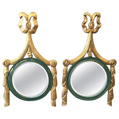 Deux miroirs italiens en bois doré à ruban