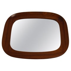 Miroir vintage avec large bord en bois