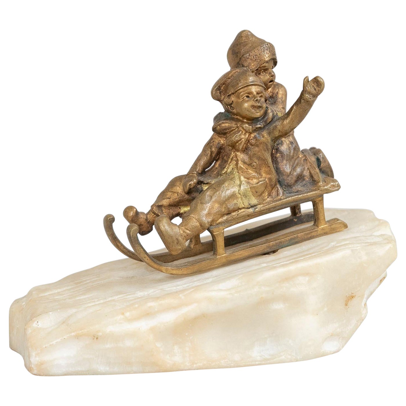 Bronze, 2 Young Children Riding on Sled on Carved White Marble Base ca. 1895 For Sale