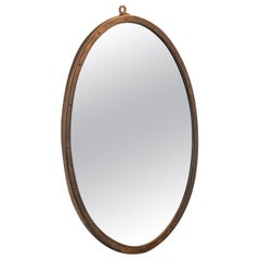 J. Muysson Jr. Oval Shaped Mirror in Patinated Brass