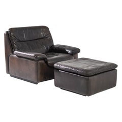 Mid-Century Leather Armchair with Ottoman by De Sede, A Pair