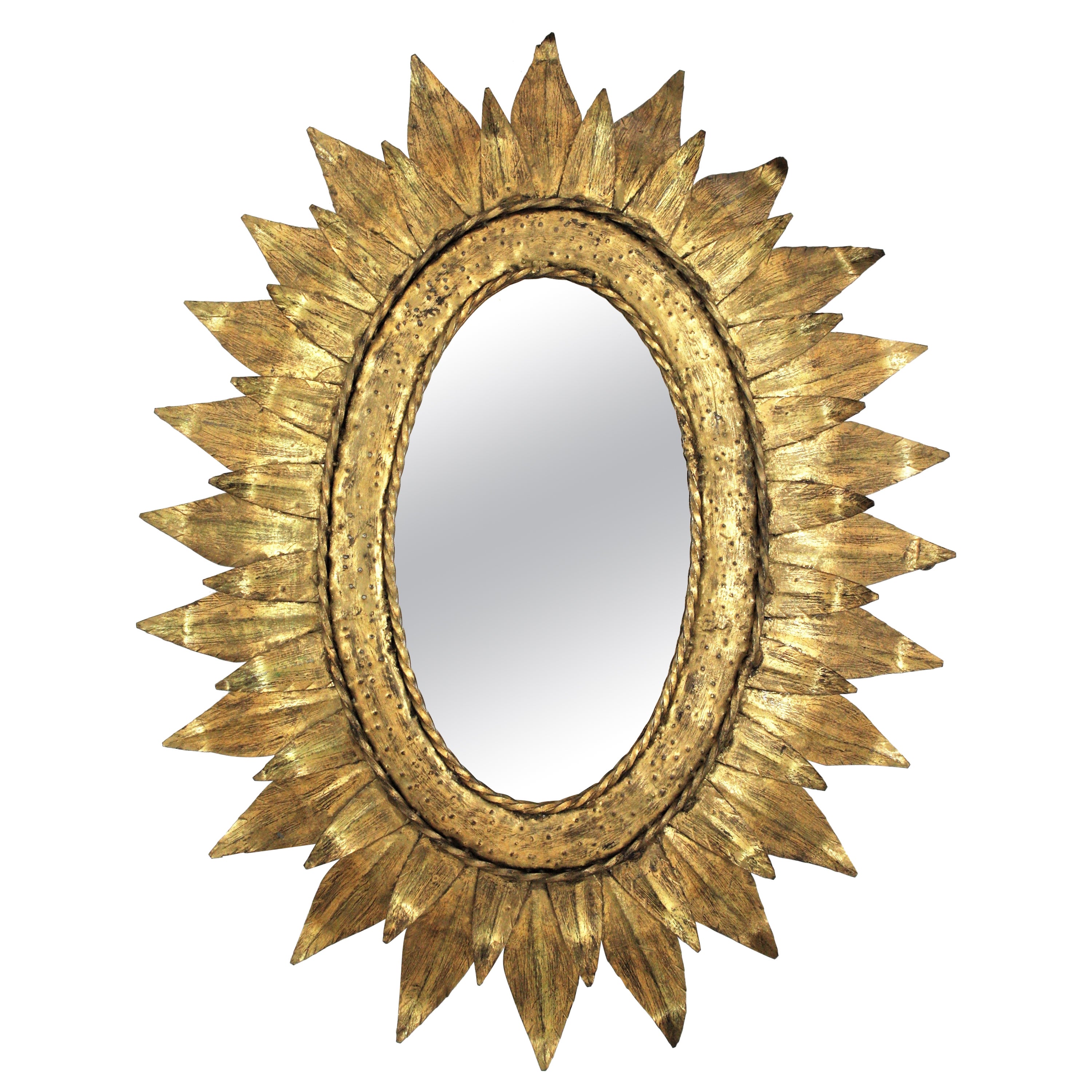 French Sunburst Oval Mirror in Gilt Metal with Double Leafed Frame For Sale
