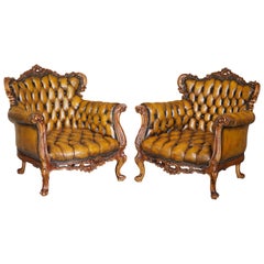 Antique Pair of Stunning circa 1900 Carved Walnut & Brown Leather Chesterfield Armchairs