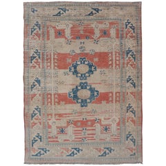 Tribal Medallion Design Vintage Turkish Oushak in Cream, Blue, and Terracotta