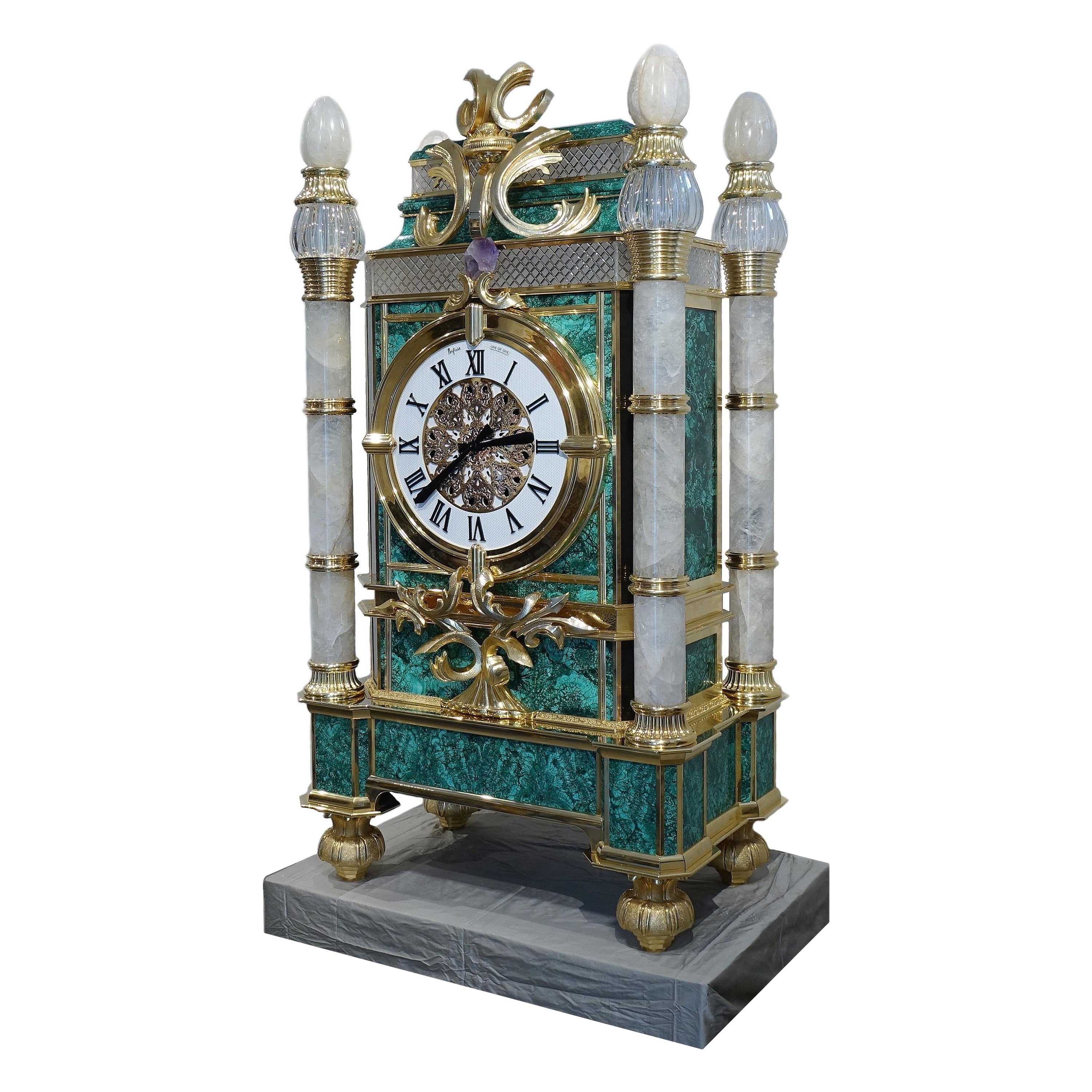 Large clock in golden bronze, malachite and rock crystal For Sale