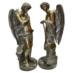Pair of Patinated Bronze Winged Figural Male Classical Greek Statues