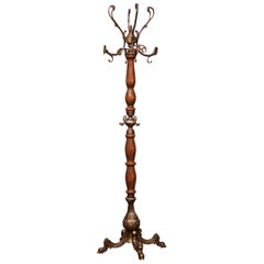 Early 20th Century French Carved Elm and Brass Swivel Dolphin Standing Hall Tree