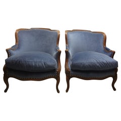 Pair of 19th Century French Louis XVI Style Walnut Bergeres