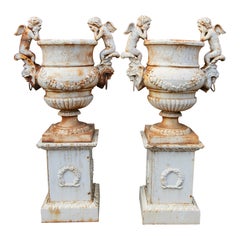 Retro Pair of Neoclassic 1990s Spanish Cast Iron Garden Urns with Putti Angels & Bases