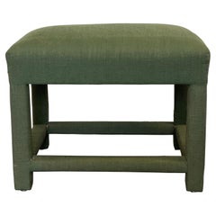 Tabouret tapissé de lin vert sur mesure