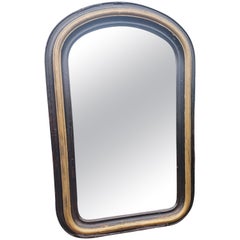 19th Century Louis Philippe Gilt Ebonized Arch Top Mirror