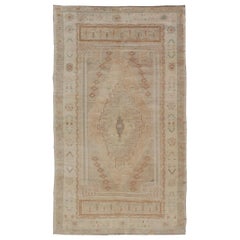 Vintage Oushak Rug from Turkey with Muted Colors and Tribal Medallion