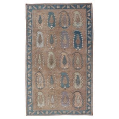 Alfombra turca Tulu Vintage con diseño Paisley a gran escala en tonos tostados, marrones y azules