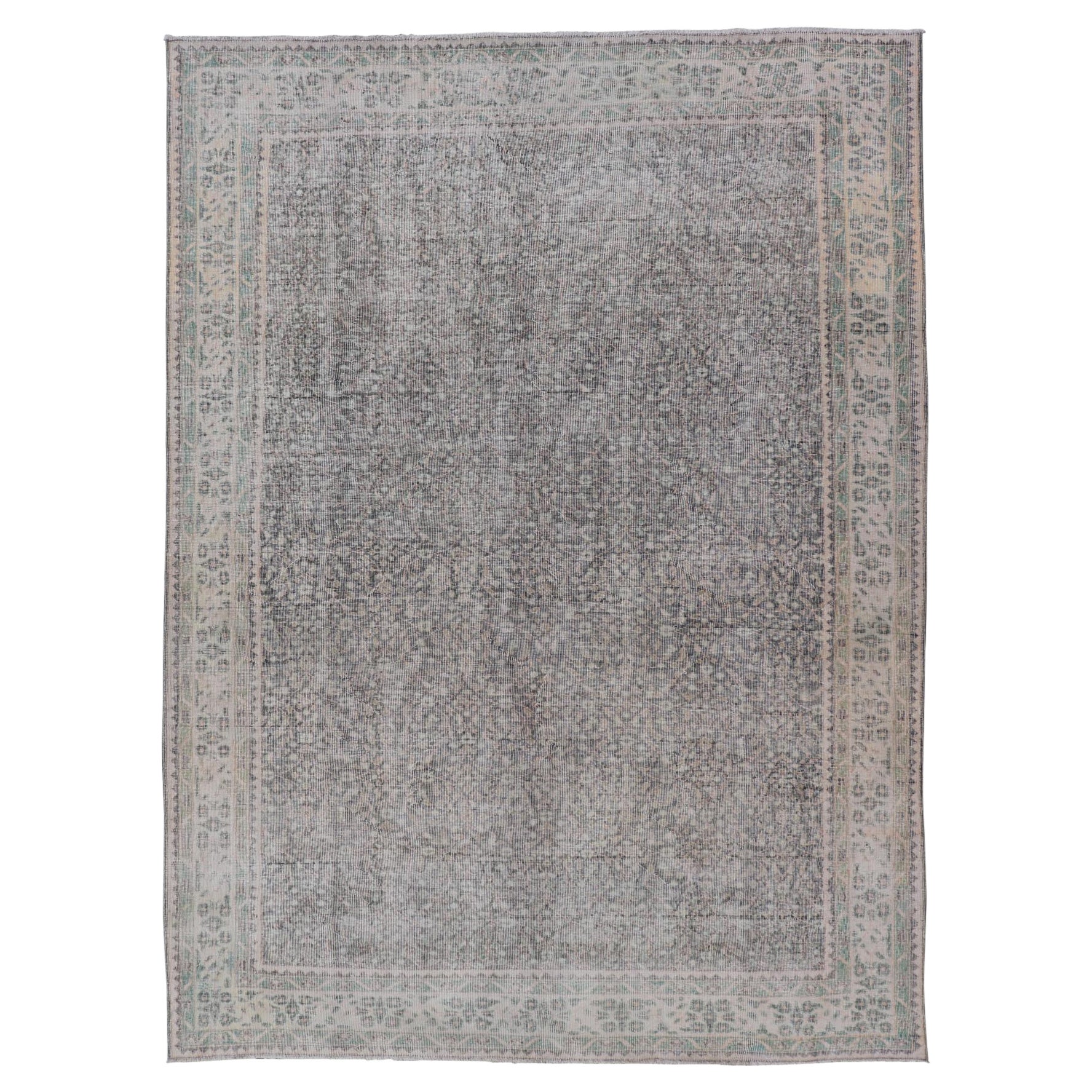 Vintage Hand-Knotted Distressed Turkish Rug in Wool with All-Over Floral Pattern For Sale