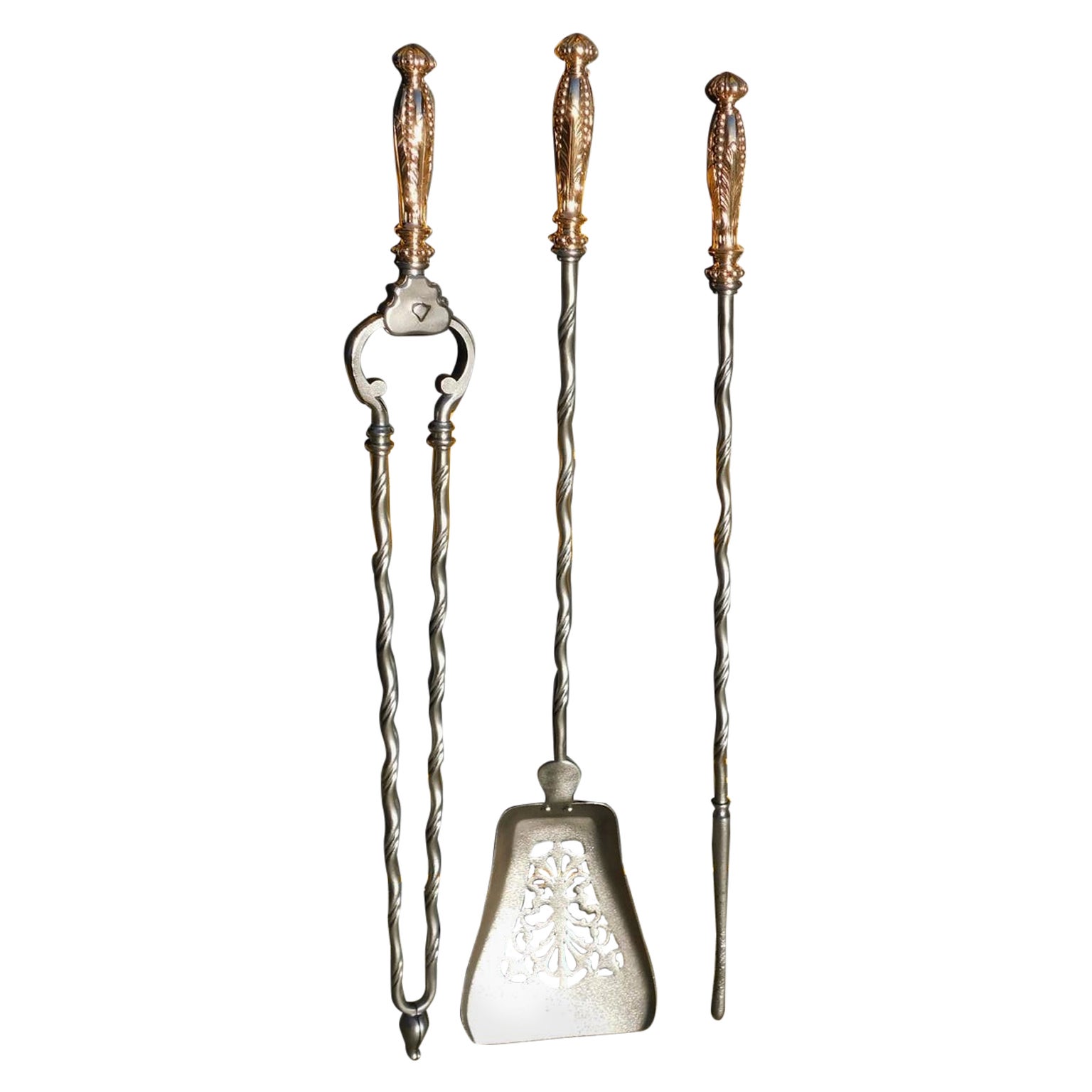 Set of English Brass and Polished Steel Pierced Foliage Fire Tools, Circa 1800 For Sale