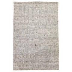 Tapis moderne en laine beige de la collection Safi d'Amadana, fabriqué à la main et entièrement conçu