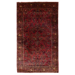 Tapis en laine rouge antique Sarouk Art Déco fait à la main à fleurs surdimensionnées