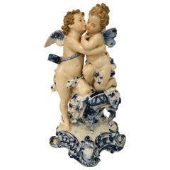 Antique Sitzendorf Dresden Figurine with Kissing Angels with Blue and White Decoration