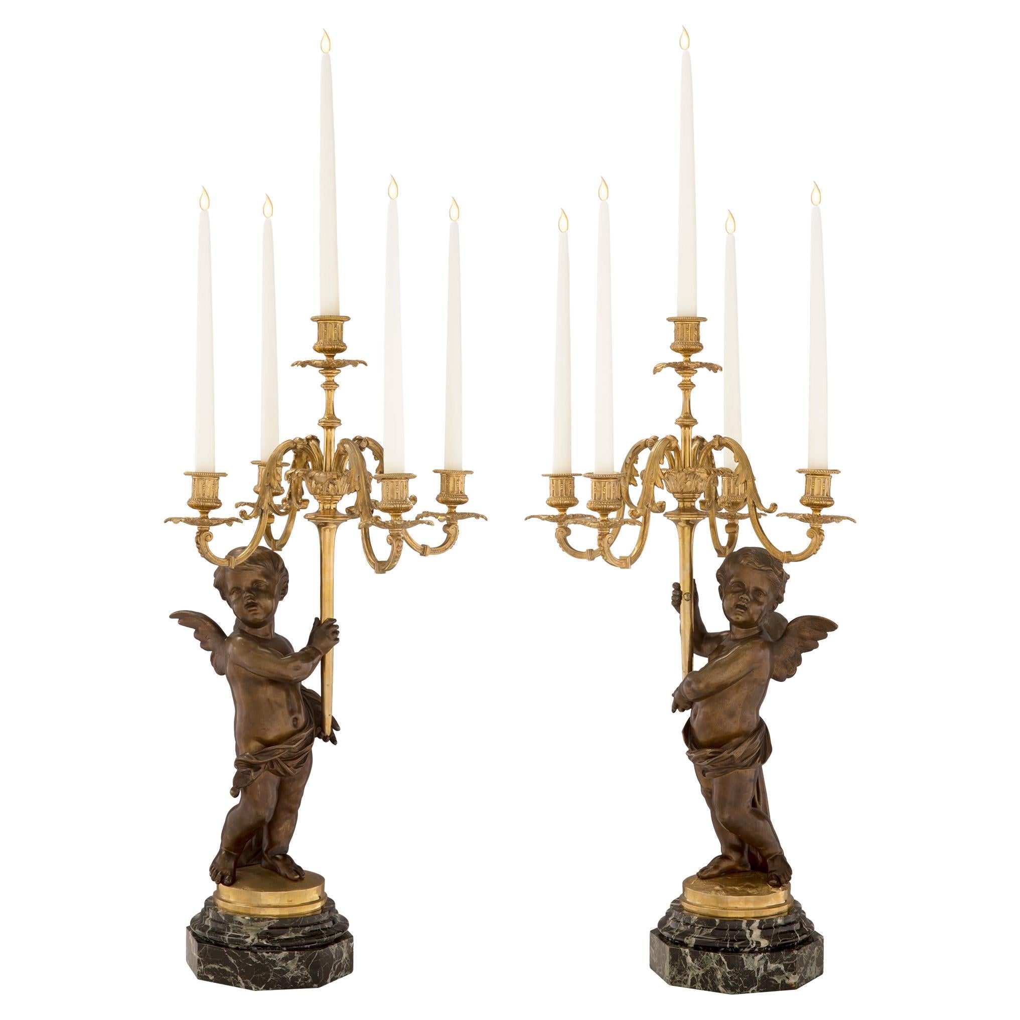 Pair of French 19th Century Louis XVI Style Winged Cherub Candelabras For Sale