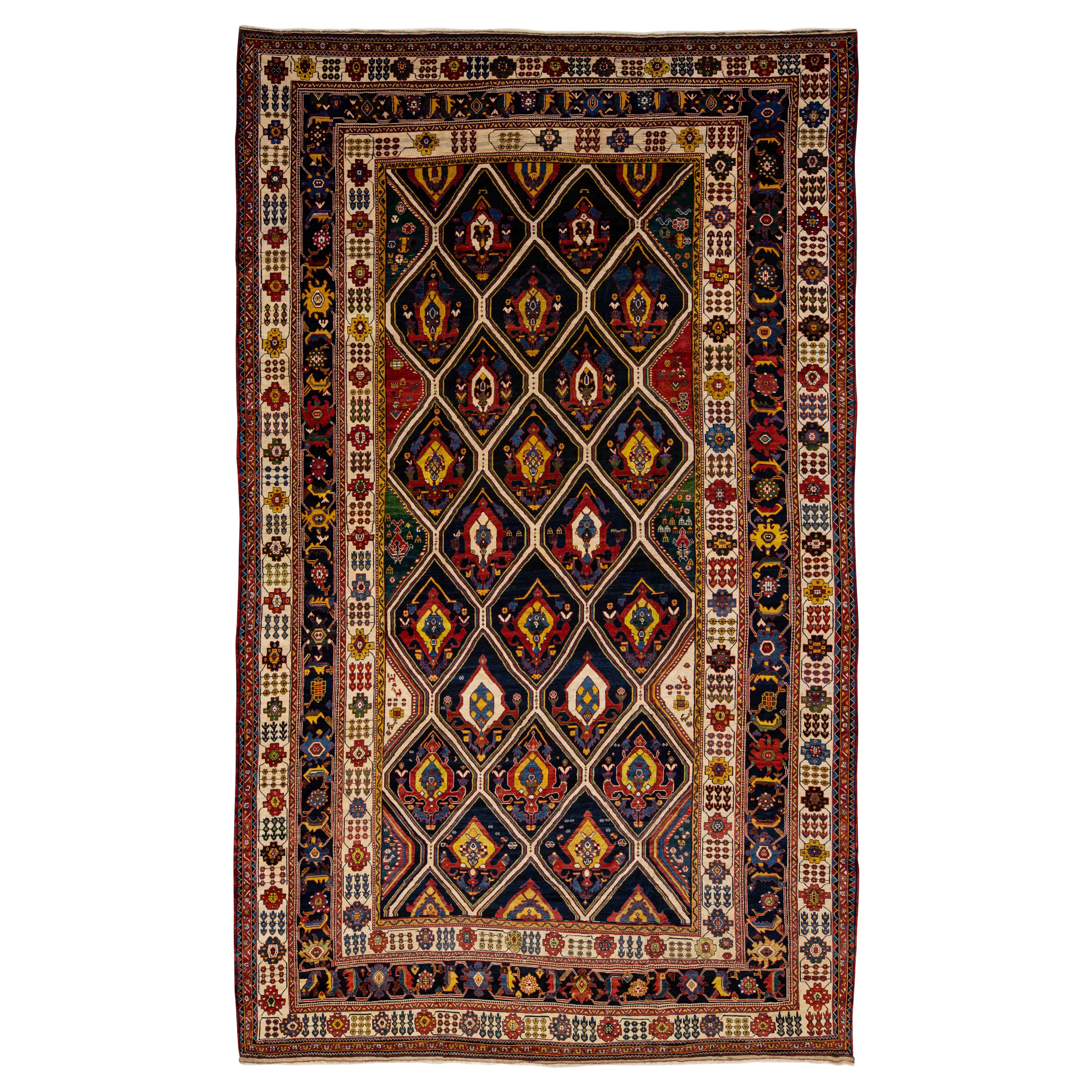 Antique Persian Bakhtiari Handmade Allover Designed Multicolor Oversize Wool Rug For Sale
