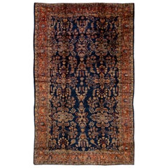 Antiker persischer Sarouk Farahan handgefertigter Oversize-Teppich aus Wolle mit Blumenmotiv in Marineblau