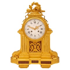 French Louis XVI Style Mid-19th Century Ormolu Marble Clock, Signed Frères