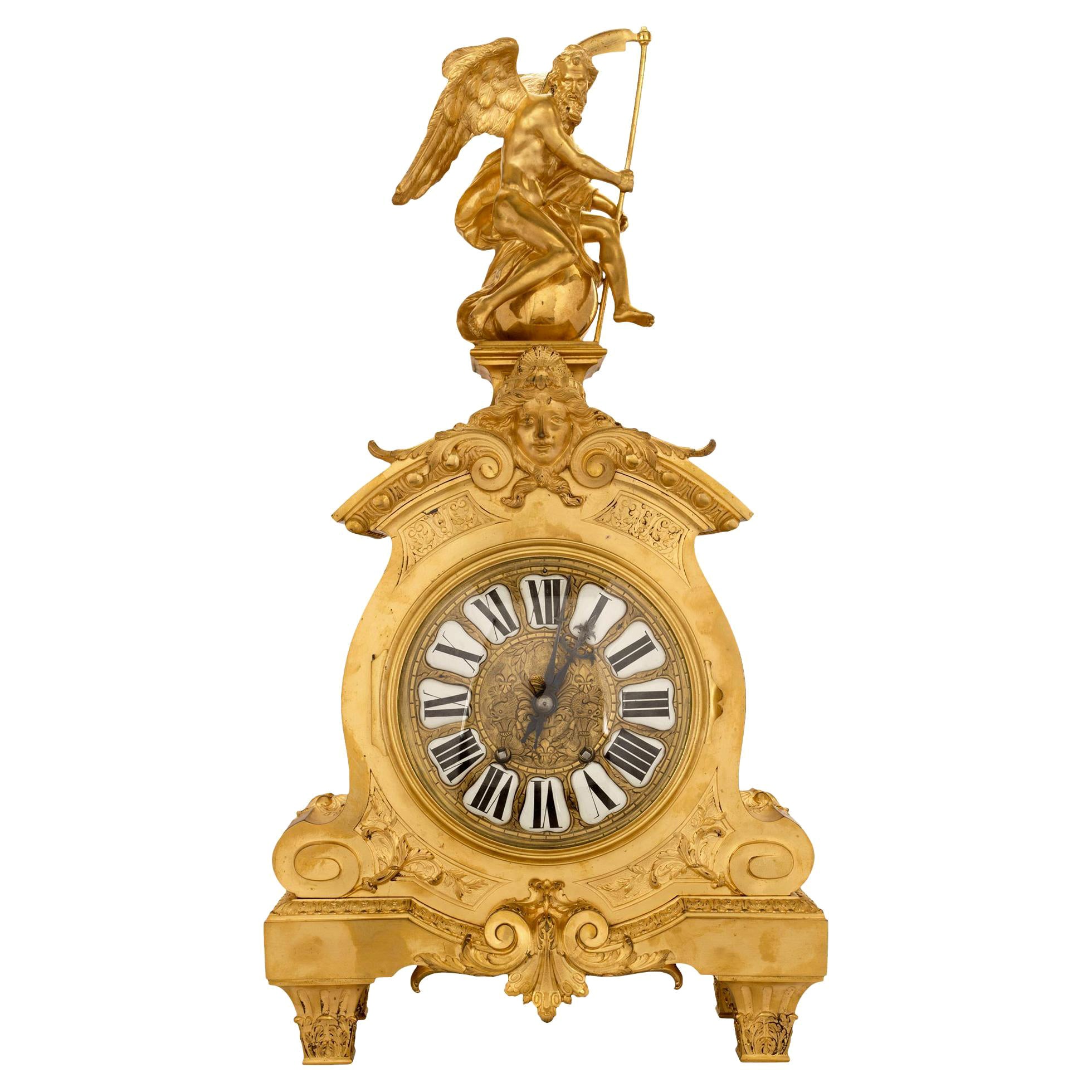 Horloge française du 19ème siècle de style Louis XIV en bronze doré