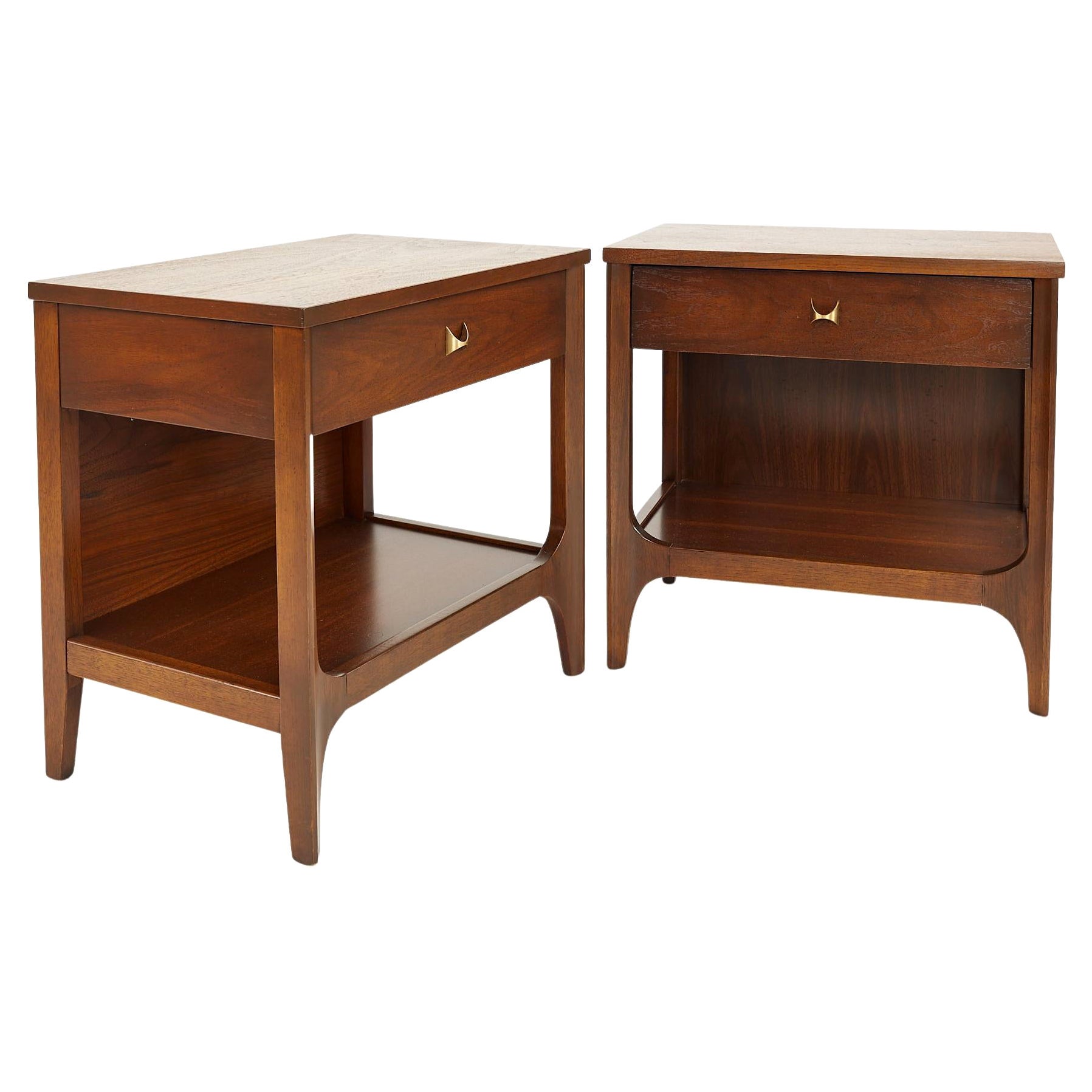 Broyhill Brasilia Brutalist mid century walnut nightstands - pair 

Each nightstand measures: 22 wide x 15 deep x 22 inches high

All pieces of furniture can be had in what we call restored vintage condition. That means the piece is restored