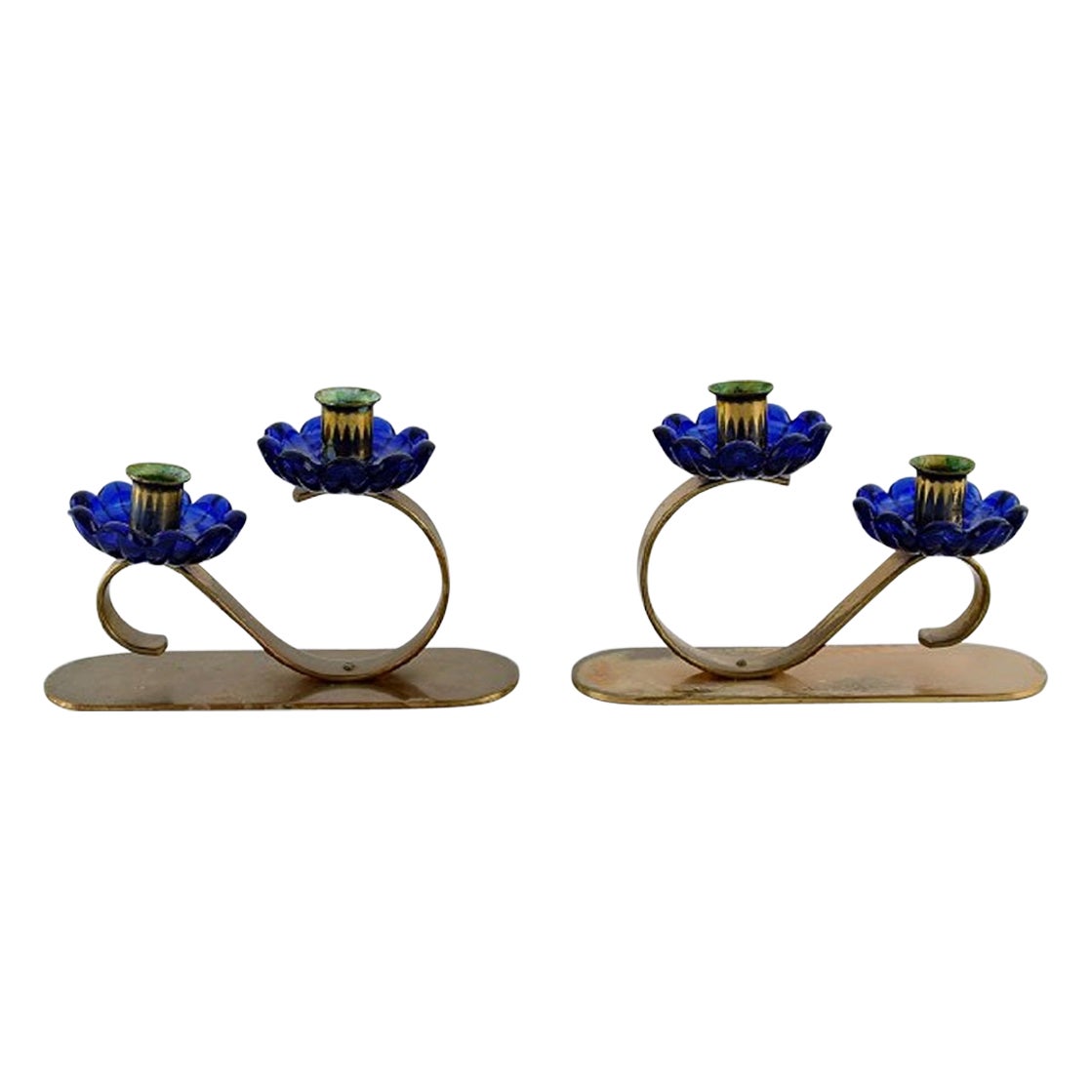 Gunnar Ander for Ystad Metall, Two Candlesticks in Brass and Blue Art Glass