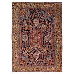 Antiker antiker persischer Heriz handgefertigter Allover-Teppich aus blauer Wolle