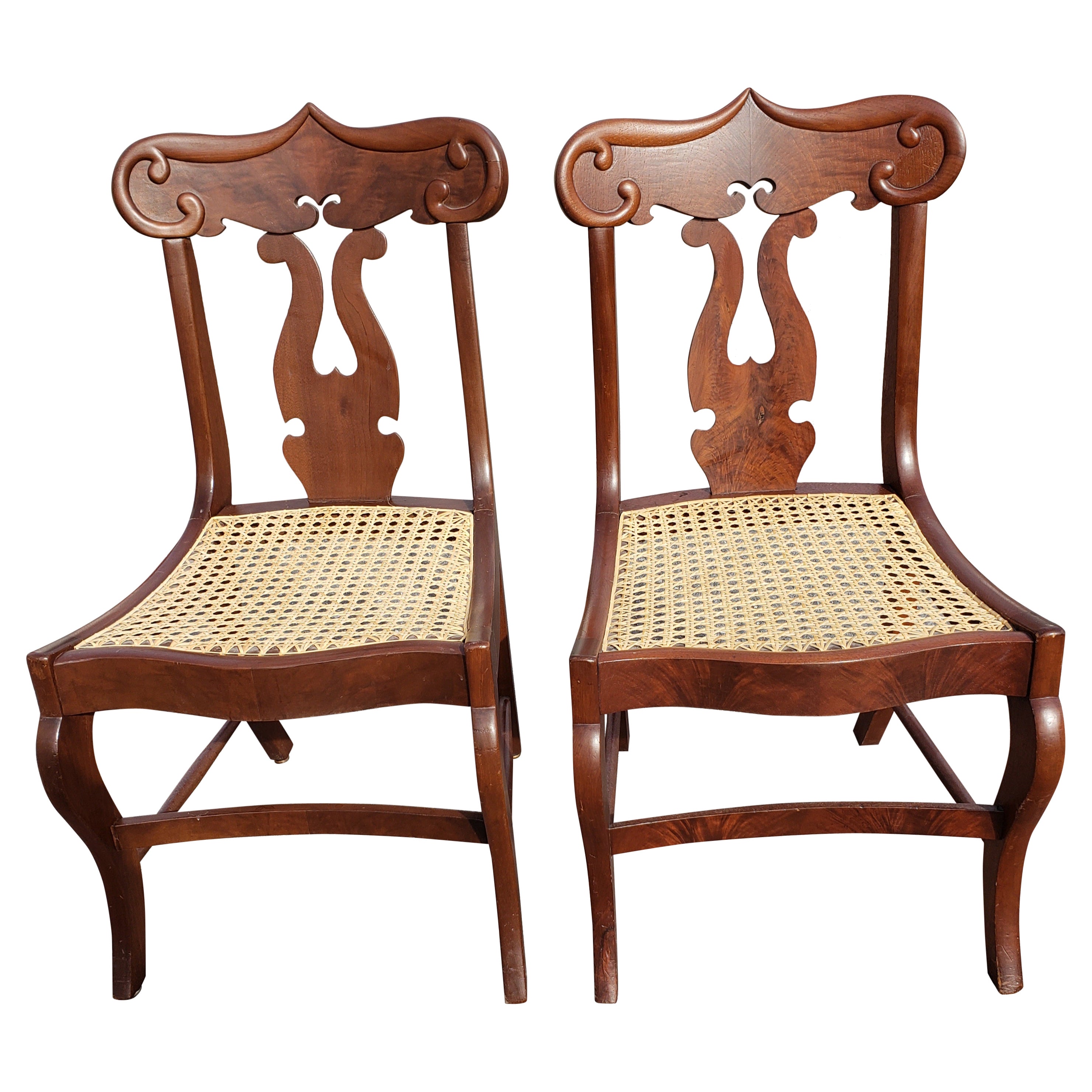 American Empire Flame Mahogany Cane Seat Chairs, circa 1890s a Pair For Sale
