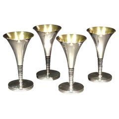 Rare Set of Four Sterling Silver Champagne Flutes Designed by Robert May, U.K