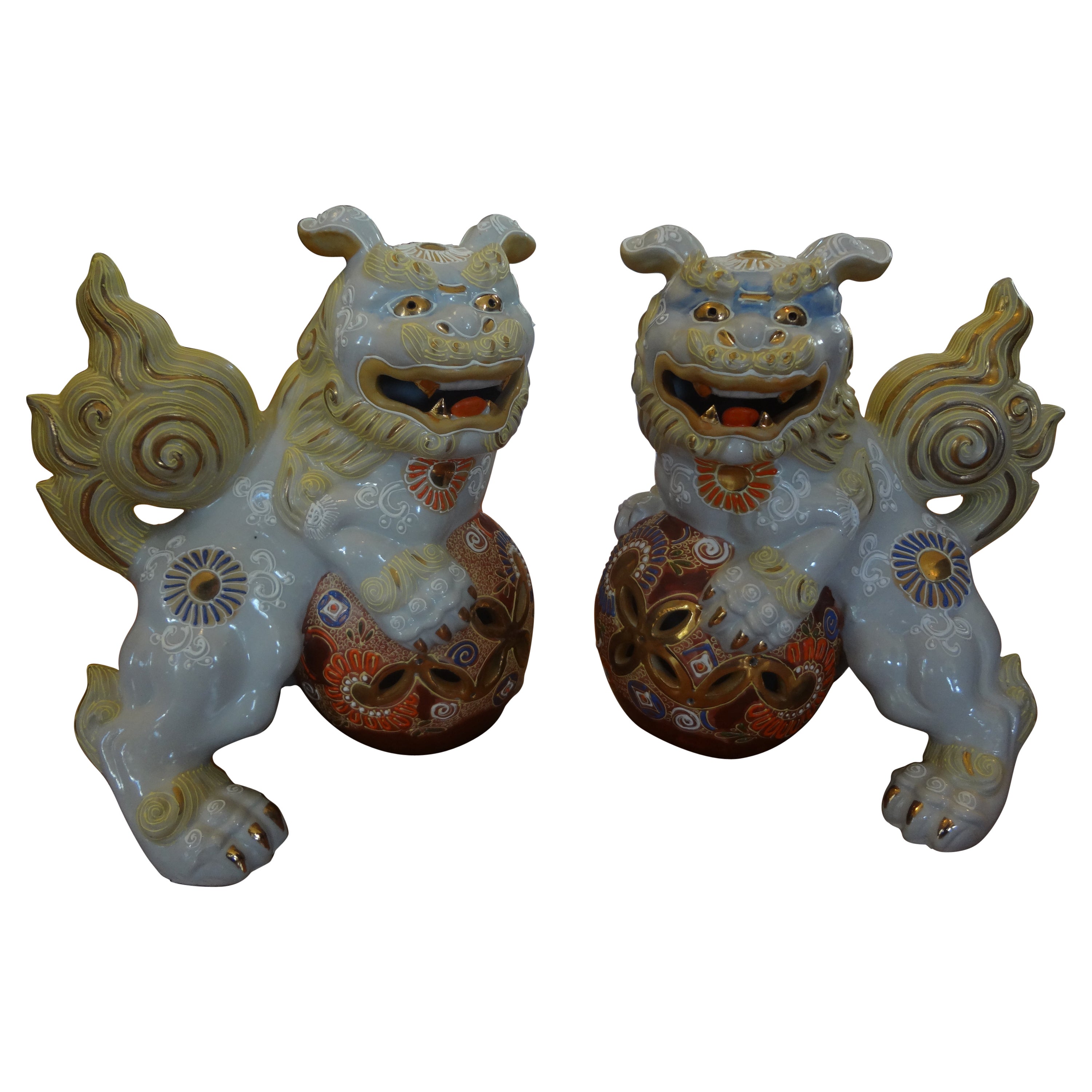 Pair of Japanese Glazed Porcelain Foo Dogs