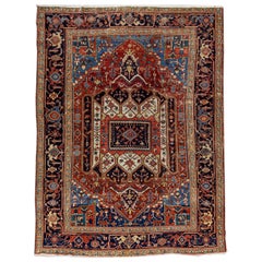 Tapis persan ancien Heriz en laine rouille, fabriqué à la main et entièrement conçu à la main