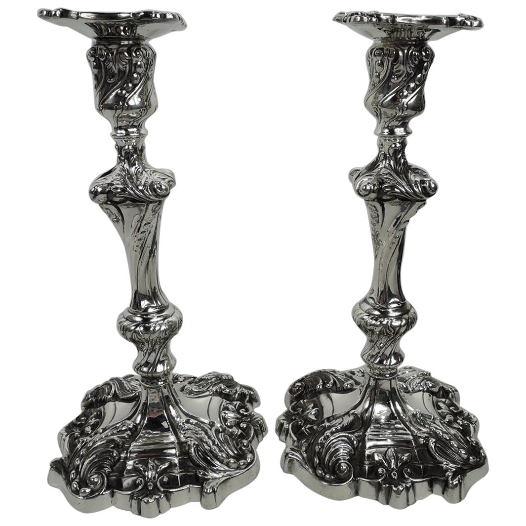 Pair of Antique Georgian Rococo Sterling Silver Candlesticks by Dominick & Haff For Sale