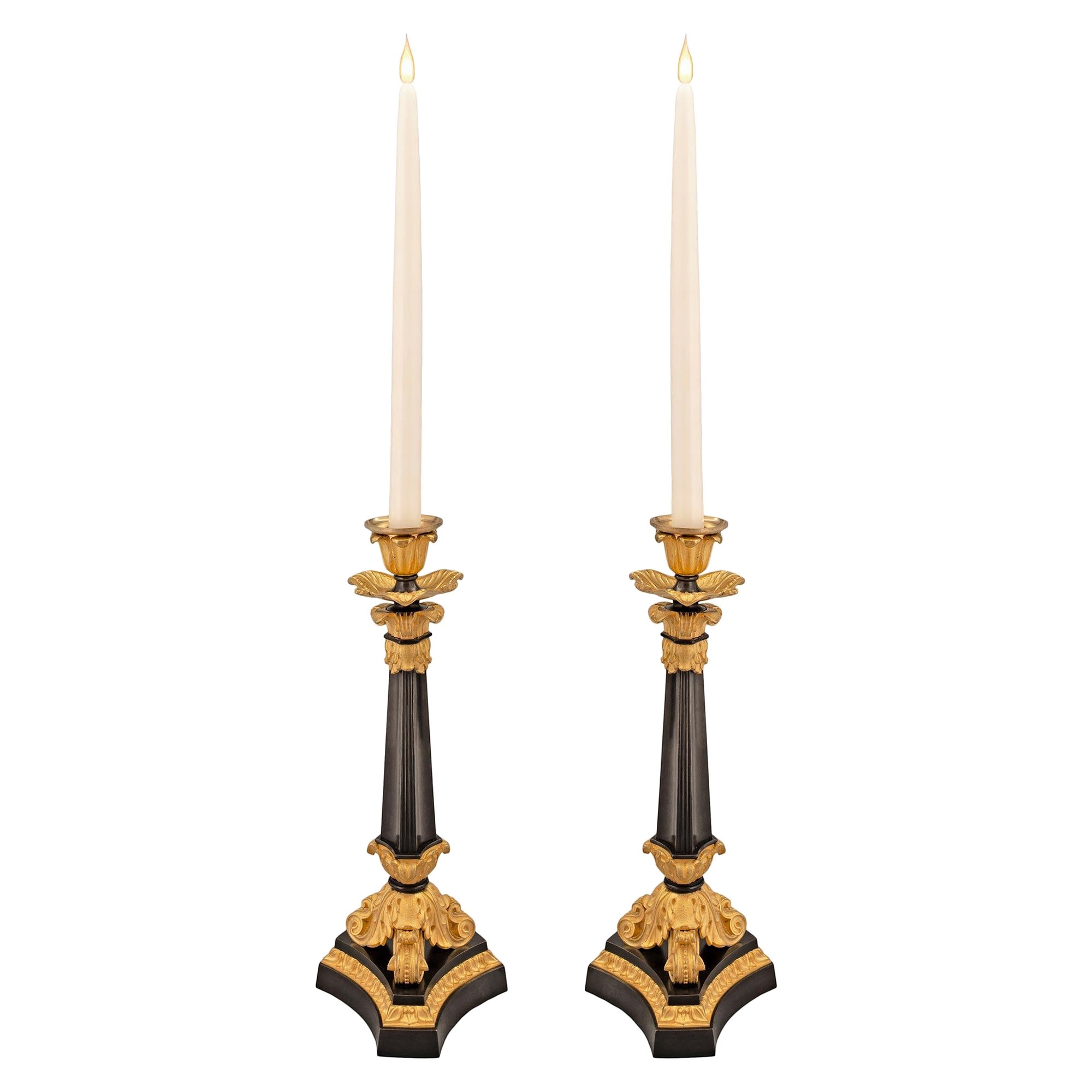 Pair of French 19th Century Charles X Period Bronze and Ormolu Candlesticks