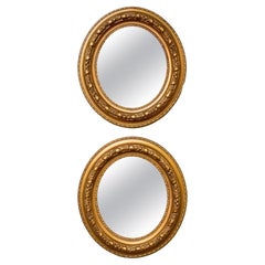 Pair of Victorian Gilded Oval Mirrors