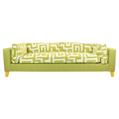 Lime Green Bench Cushion Sofa with Maze Pattern Cushions and Sunflower Feet