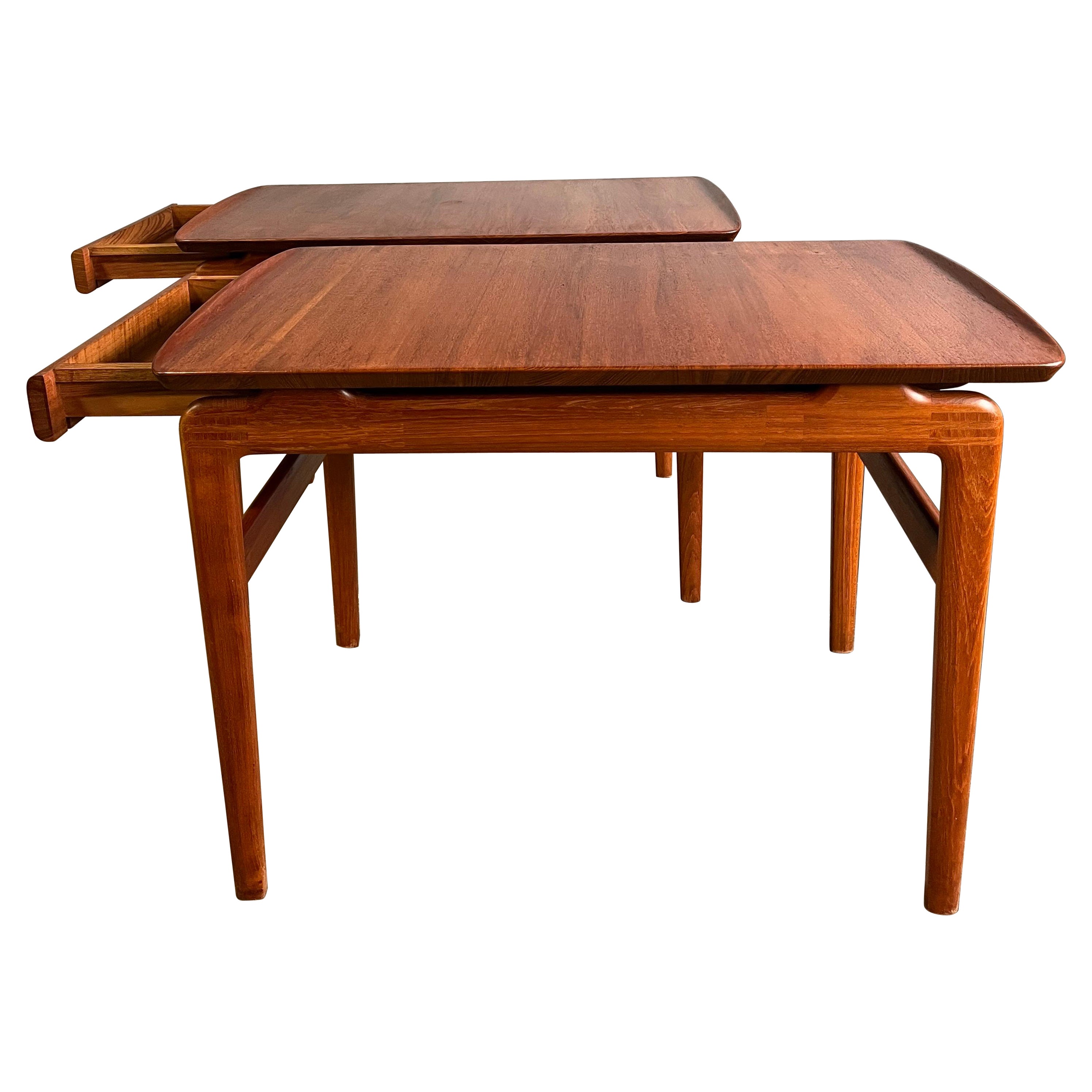 Midcentury Peter Hvidt and Mølgaard-Nelson for France & Søn teak side tables or night stands with drawer. Similar raised edge design as Arne Vodder. Gorgeous design featuring solid wood construction with finger jointed details. Each table has a