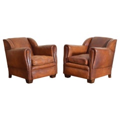 Pair French Late Art Deco Leather Upholstered Club Chairs, ca. 1940