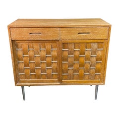 Credenza con cómoda frontal tejida Edward Wormley